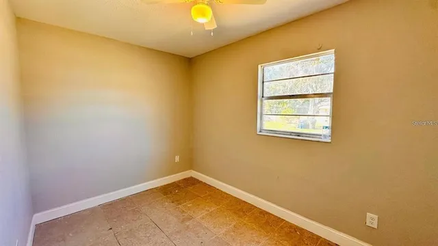 an empty room with a window
