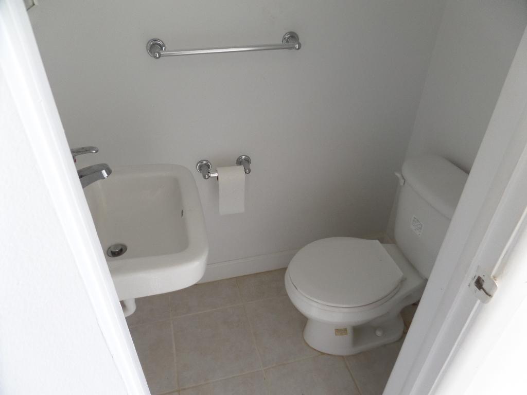 1501 Crescent Circle, Unit C20 Lake Park, FL 33403 - Photo 6 of 9 Half Bath.jpg new