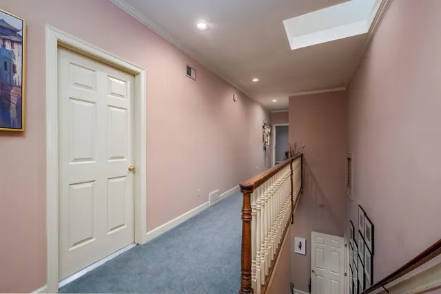 a view of hallway with stairs