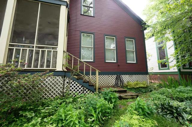 a view of a back yard of the house