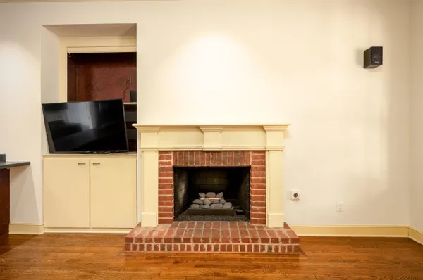 a kitchen with a sink stove and microwave