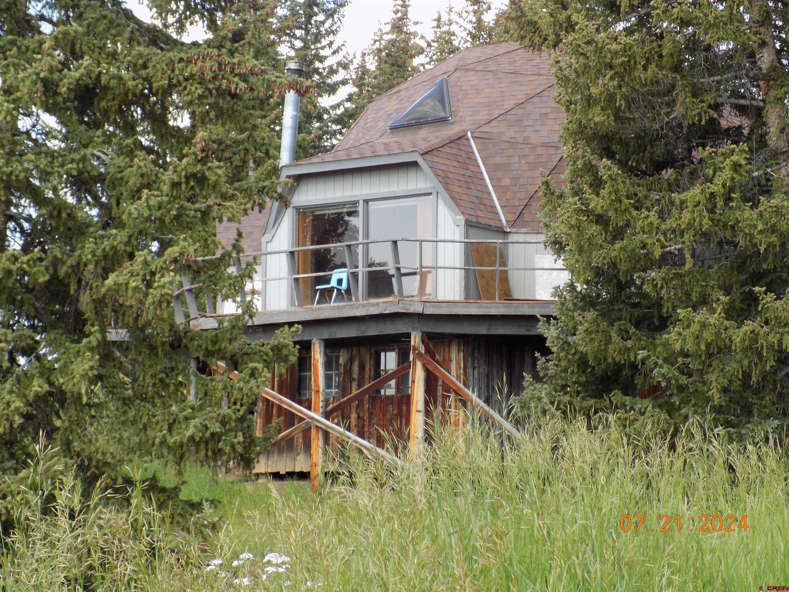 95 Geneva Loop Pitkin, CO 81241 - Photo 2 of 14 a house view with a backyard space
