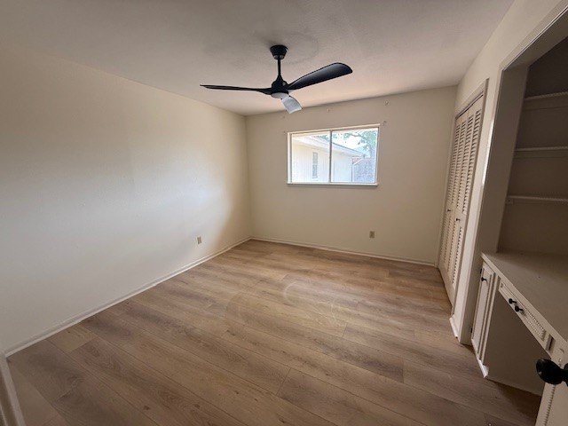 6410 Clearlake Circle Corpus Christi, TX 78413 - Photo 11 of 20 a view of empty room with wooden floor and fan