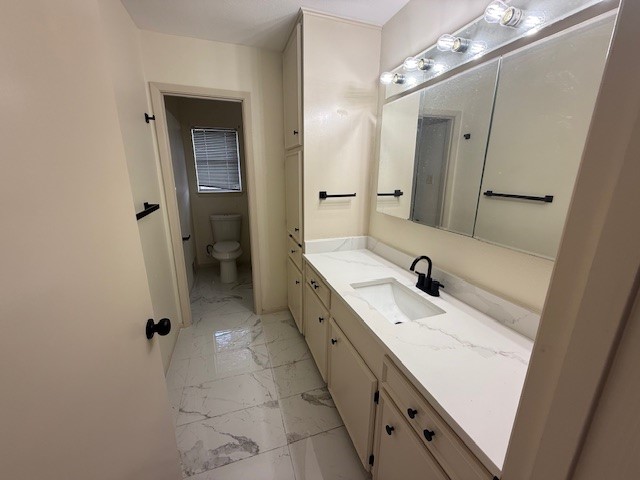 6410 Clearlake Circle Corpus Christi, TX 78413 - Photo 13 of 20 a spacious bathroom with a double vanity sink a mirror and a bathtub