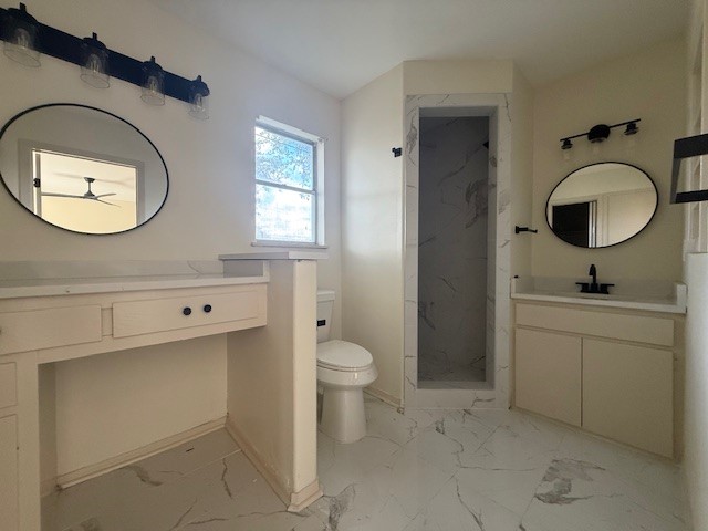6410 Clearlake Circle Corpus Christi, TX 78413 - Photo 15 of 20 a bathroom with a toilet sink and mirror