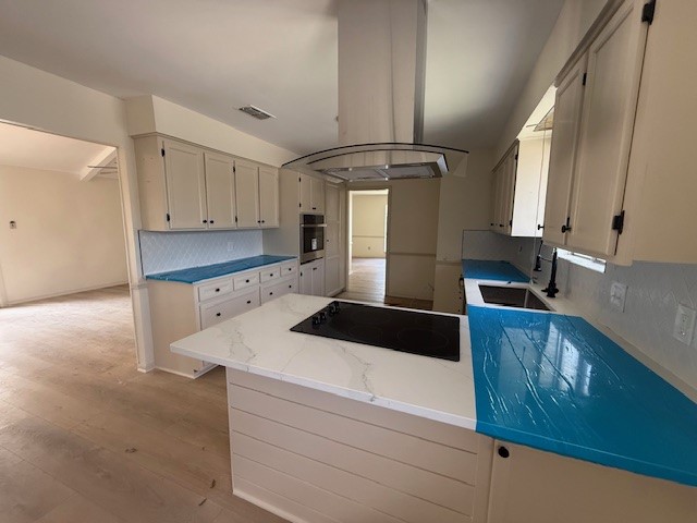 6410 Clearlake Circle Corpus Christi, TX 78413 - Photo 6 of 20 a kitchen with granite countertop a sink and cabinets