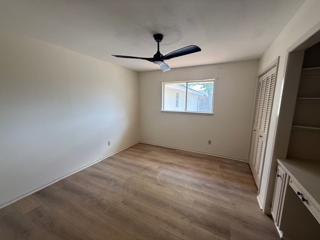 6410 Clearlake Circle Corpus Christi, TX 78413 - Photo 8 of 20 a view of a room with a flat screen tv and a ceiling fan