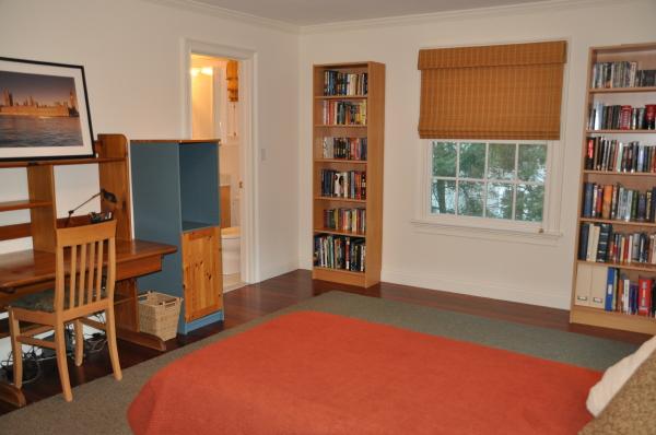 39 Windsor Road Wellesley, MA 02481 - Photo 19 of 23 a living room with furniture and a book shelf