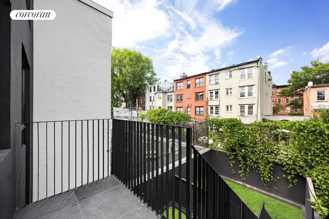 a view of a building from a balcony