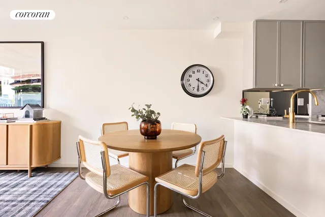 a view of a dining room with furniture and a table