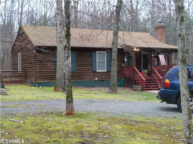 3059 Broadstreet Road Gum Spring, VA 23065 - Photo 1 of 3 a view of a house with a yard and tree