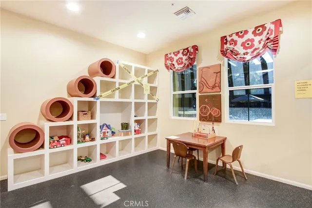 a view of a table and chairs in a room