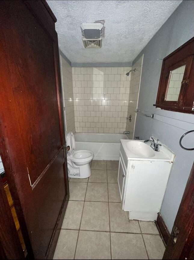 1815 Riverdale Road Southeast Roanoke, VA 24014 - Photo 8 of 10 a bathroom with a sink toilet and shower