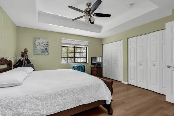 a bed room with a bed and a window