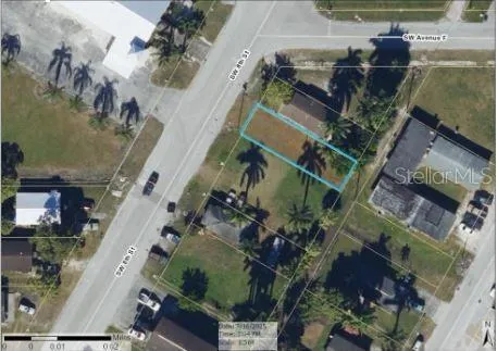 an aerial view of a house with outdoor space