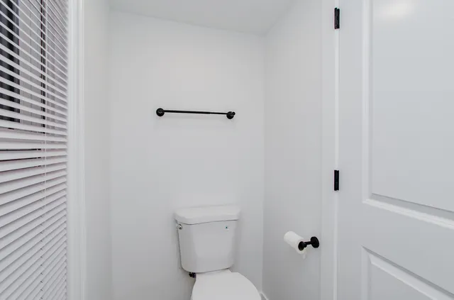 a bathroom with a toilet
