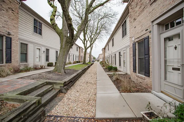 a view of a house with a street