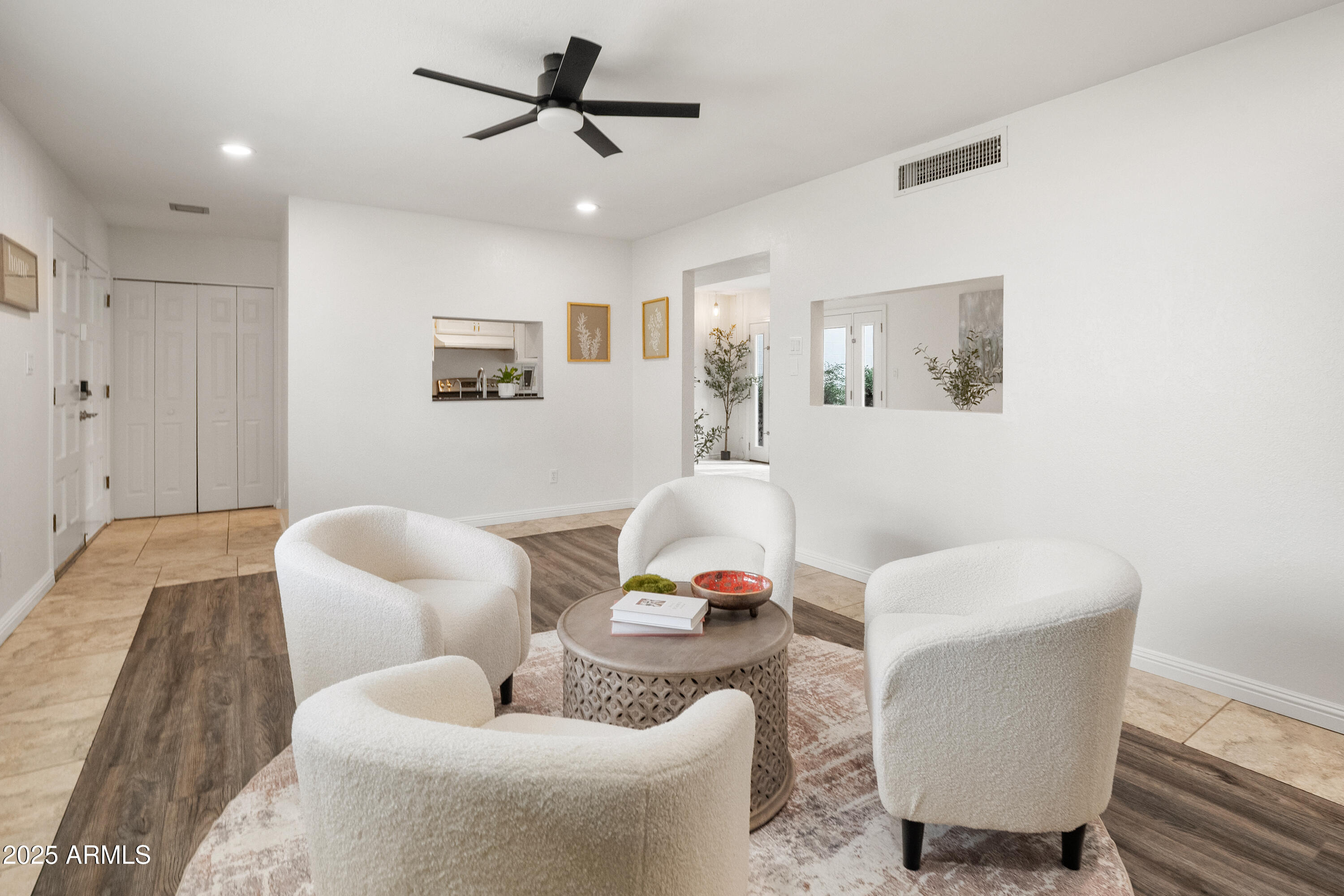 3928 North Granite Reef Road Scottsdale, AZ 85251 - Photo 13 of 30 a living room with furniture and a wooden floor