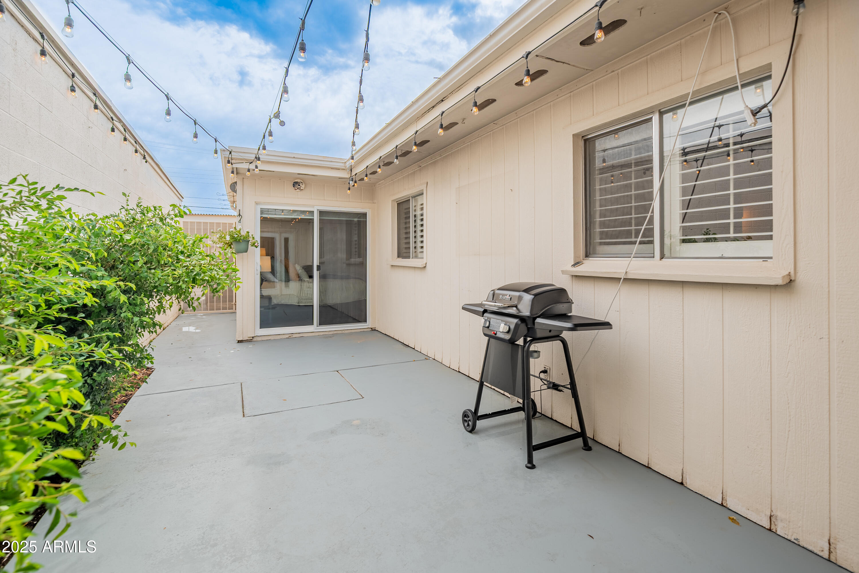 3928 North Granite Reef Road Scottsdale, AZ 85251 - Photo 20 of 30 a view of a porch with furniture and a window