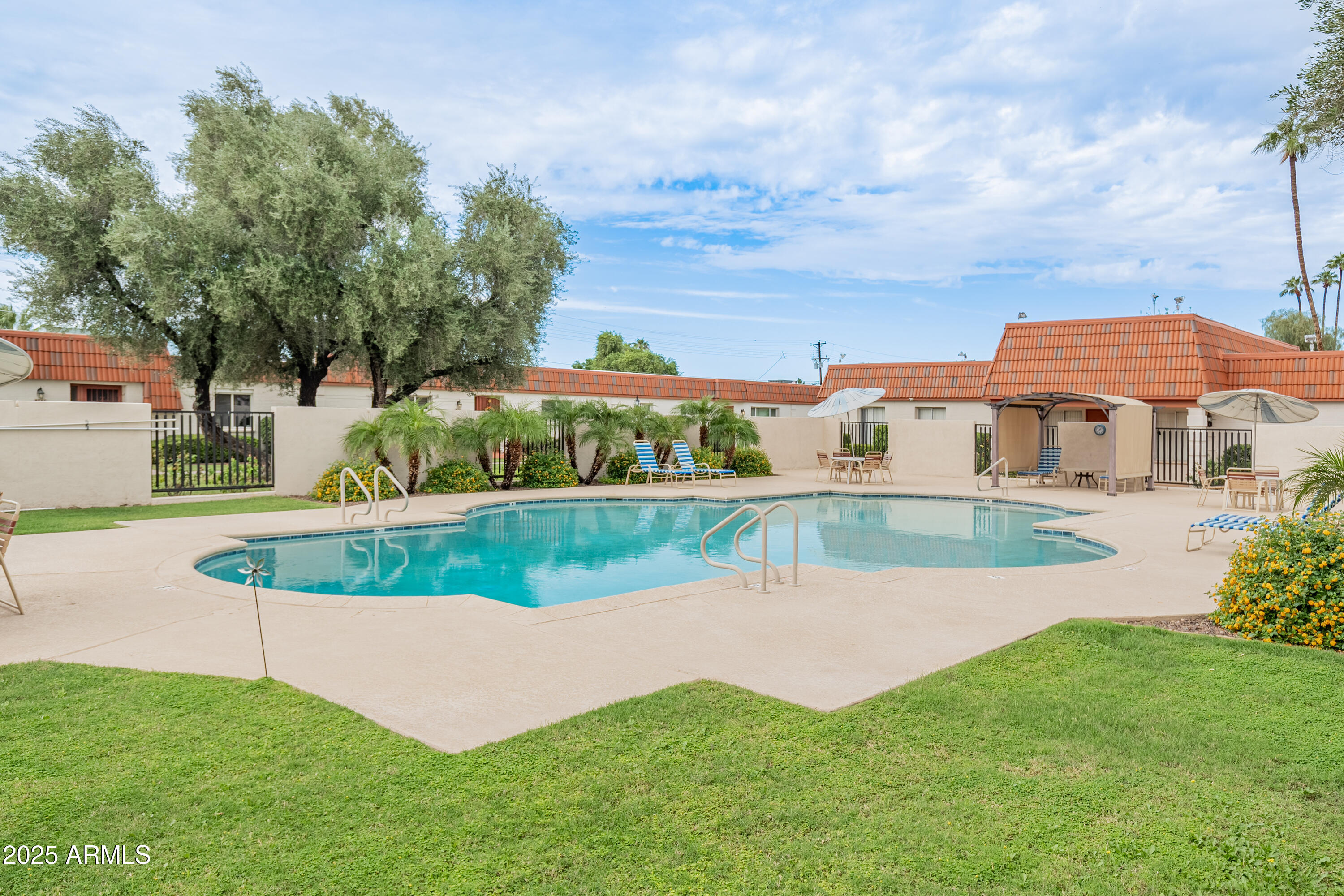 3928 North Granite Reef Road Scottsdale, AZ 85251 - Photo 22 of 30 a view of a house with a yard and sitting area