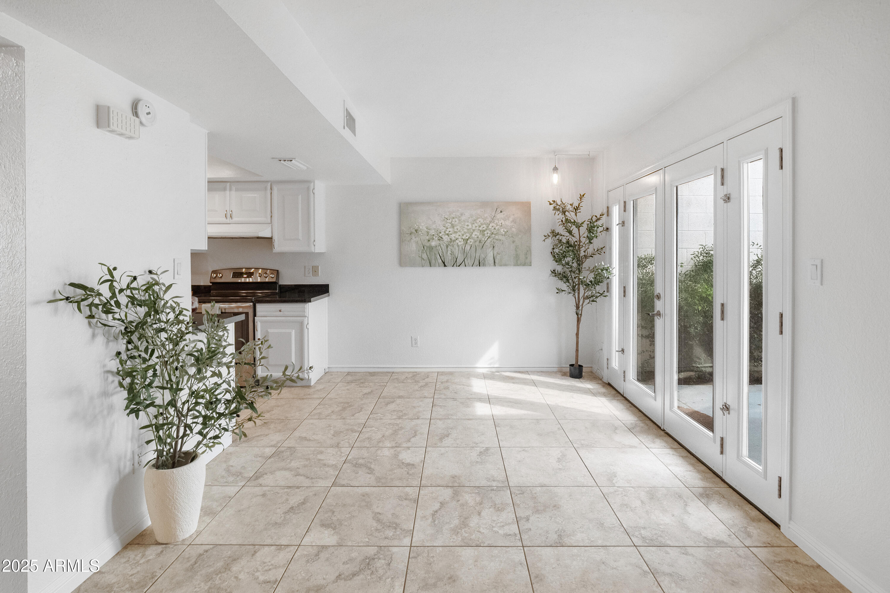 3928 North Granite Reef Road Scottsdale, AZ 85251 - Photo 25 of 30 a view of a kitchen with furniture and an entryway