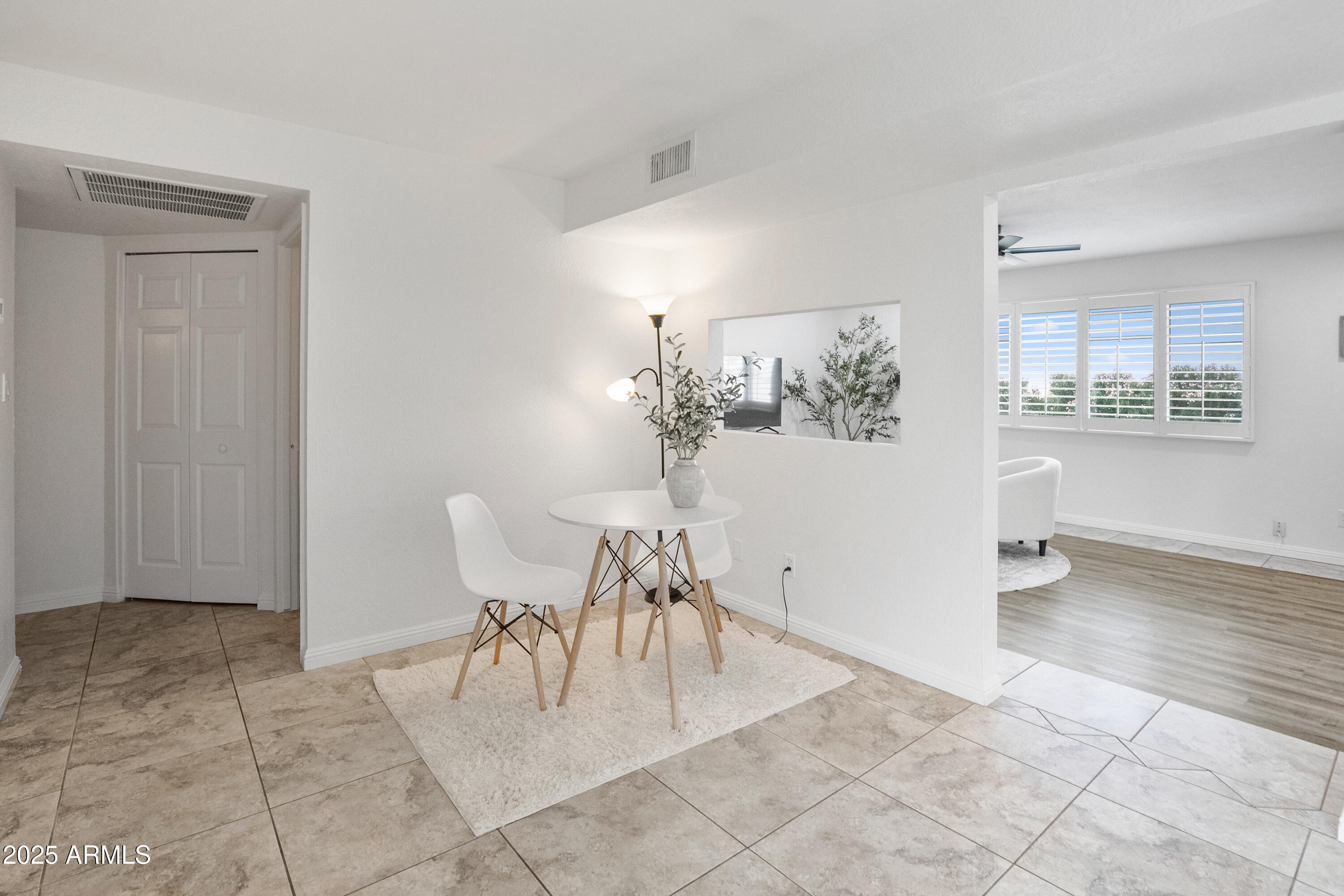 3928 North Granite Reef Road Scottsdale, AZ 85251 - Photo 27 of 30 a view of a room with furniture and wooden floor