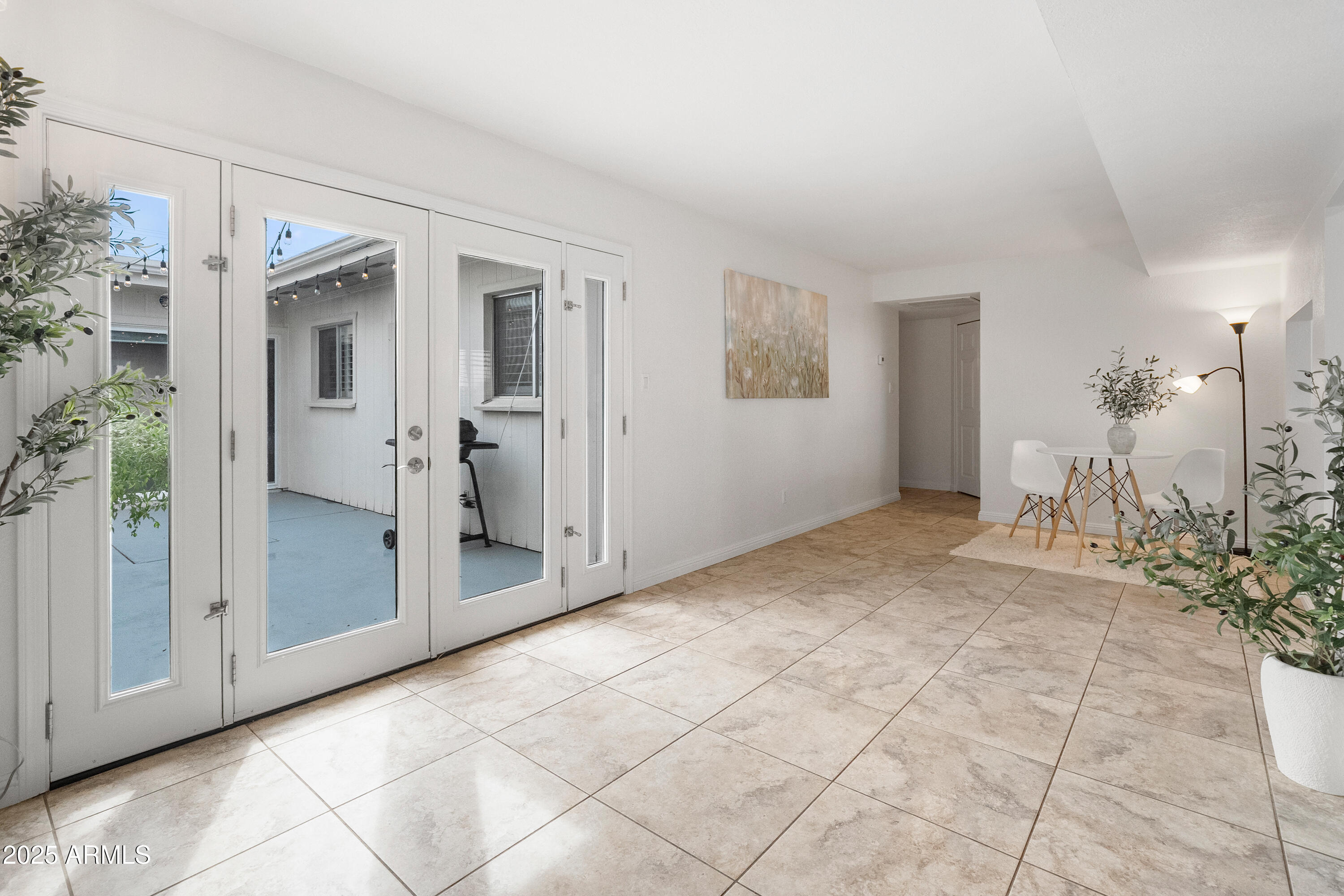 3928 North Granite Reef Road Scottsdale, AZ 85251 - Photo 28 of 30 a view of a room with a chandelier