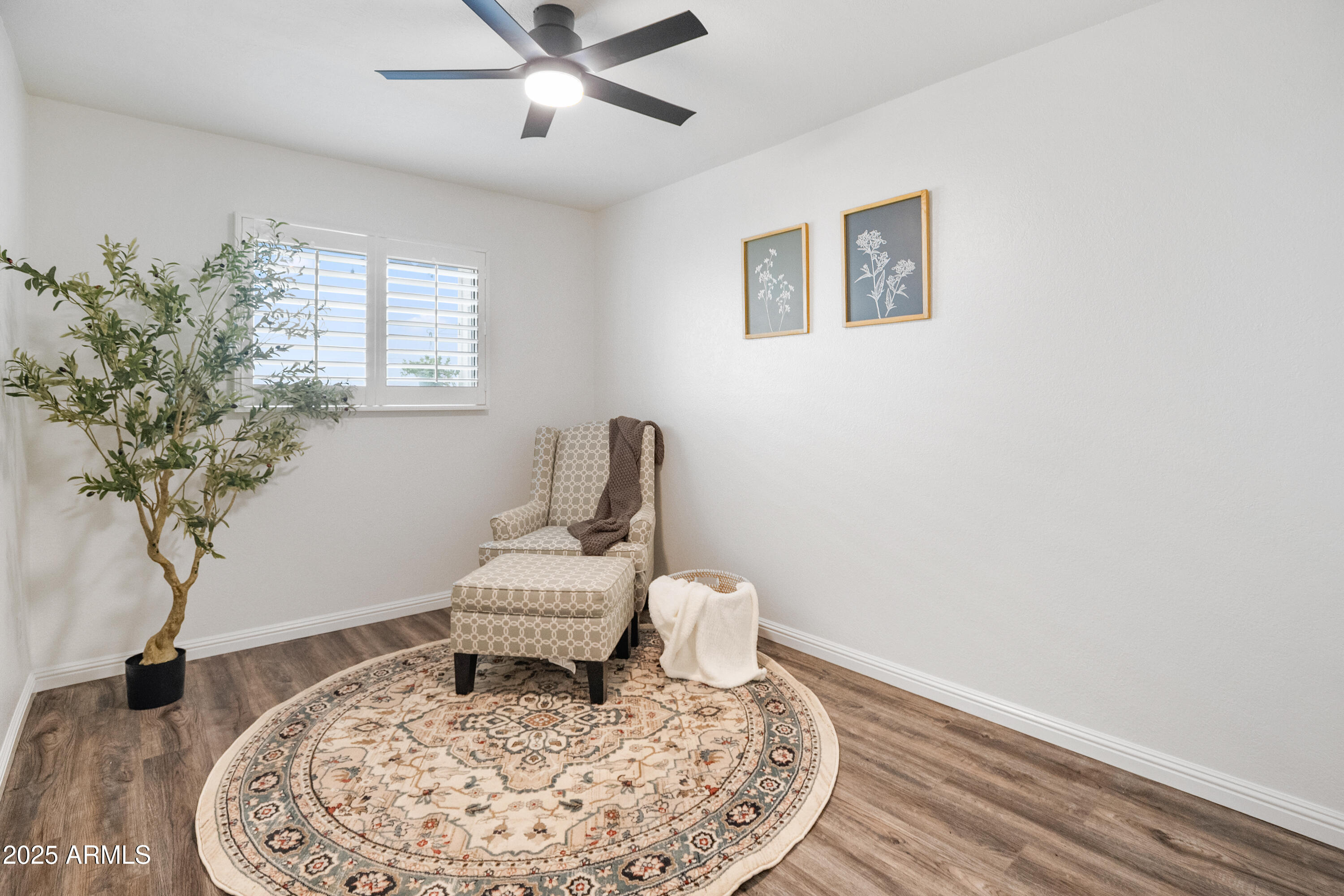 3928 North Granite Reef Road Scottsdale, AZ 85251 - Photo 8 of 30 a living room with furniture and a potted plant