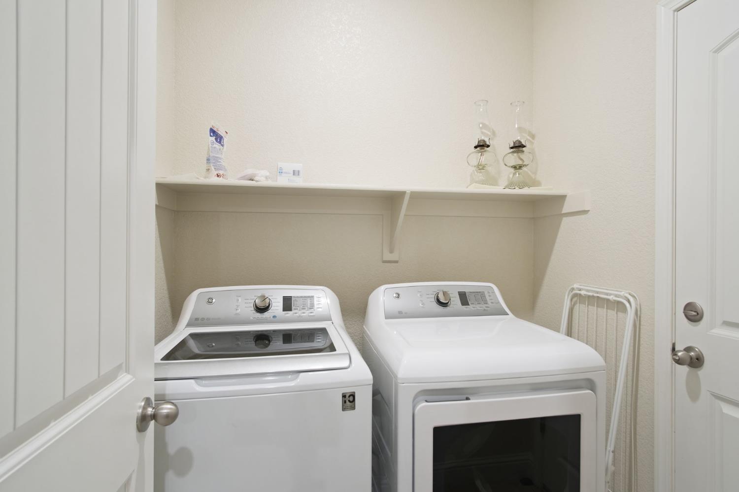 3790 Bonifacio Way Merced, CA 95340 - Photo 18 of 21 a utility room with dryer and washer