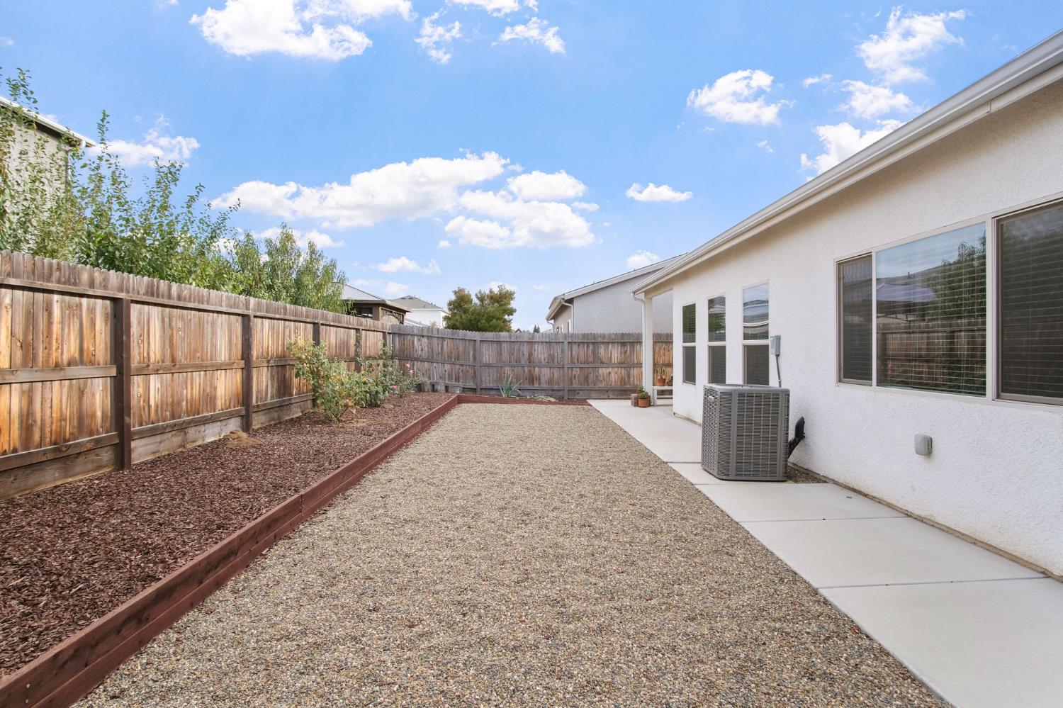 3790 Bonifacio Way Merced, CA 95340 - Photo 19 of 21 a view of a house with backyard and sitting area