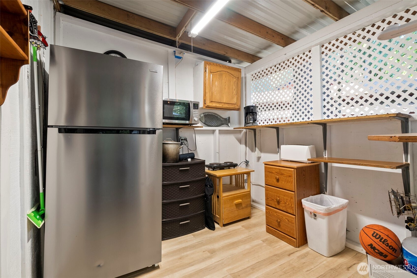560 North Beacon Point Loop North Lilliwaup, WA 98555 - Photo 20 of 40 a kitchen with stainless steel appliances a refrigerator and a stove