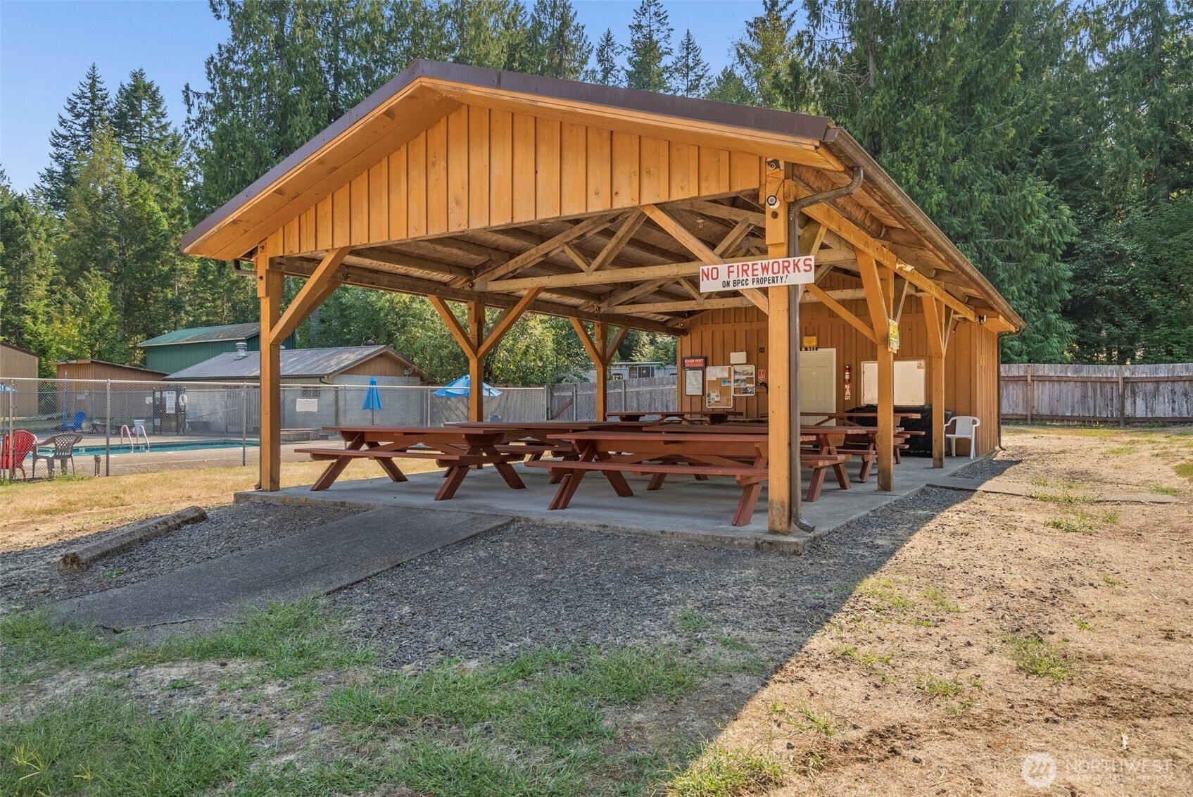 560 North Beacon Point Loop North Lilliwaup, WA 98555 - Photo 25 of 40 a view of a house with backyard and sitting area