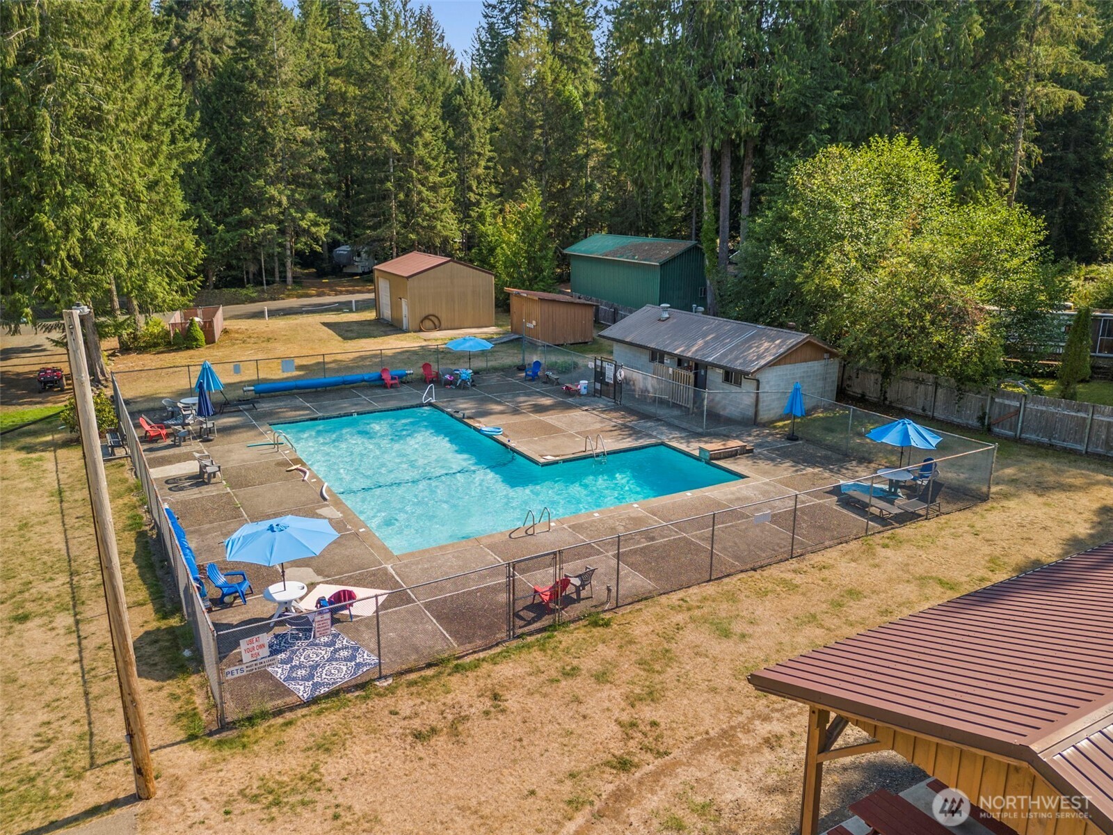 560 North Beacon Point Loop North Lilliwaup, WA 98555 - Photo 28 of 40 a view of swimming pool with chairs