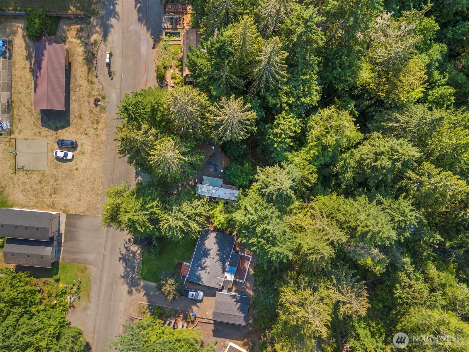 560 North Beacon Point Loop North Lilliwaup, WA 98555 - Photo 29 of 40 an aerial view of residential house with outdoor space and trees all around