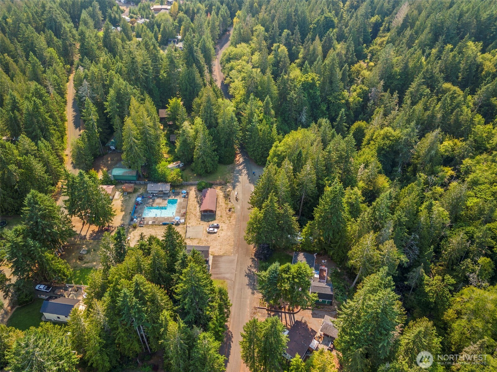 560 North Beacon Point Loop North Lilliwaup, WA 98555 - Photo 30 of 40 an aerial view of residential house with outdoor space and trees all around