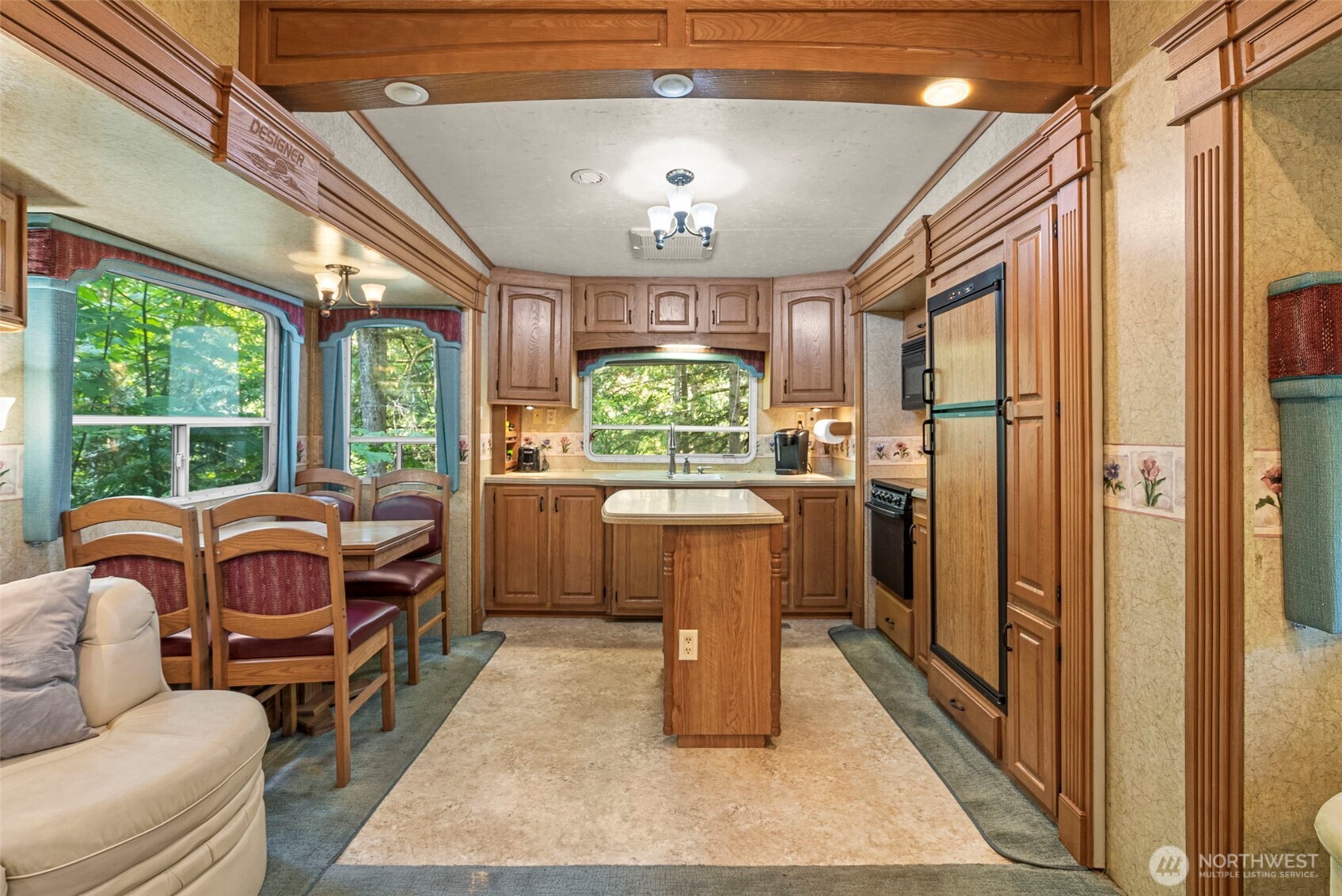 560 North Beacon Point Loop North Lilliwaup, WA 98555 - Photo 6 of 40 a very nice looking room with a large window