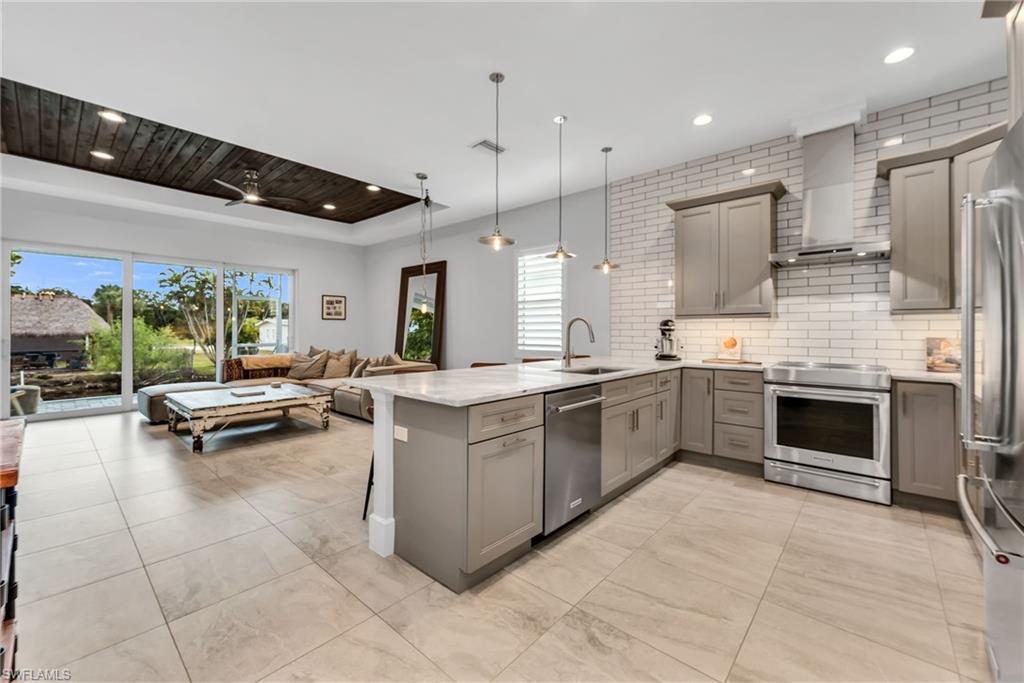 2464 Lake Avenue Naples, FL 34112 - Photo 3 of 38 Kitchen to Living Room - View 1