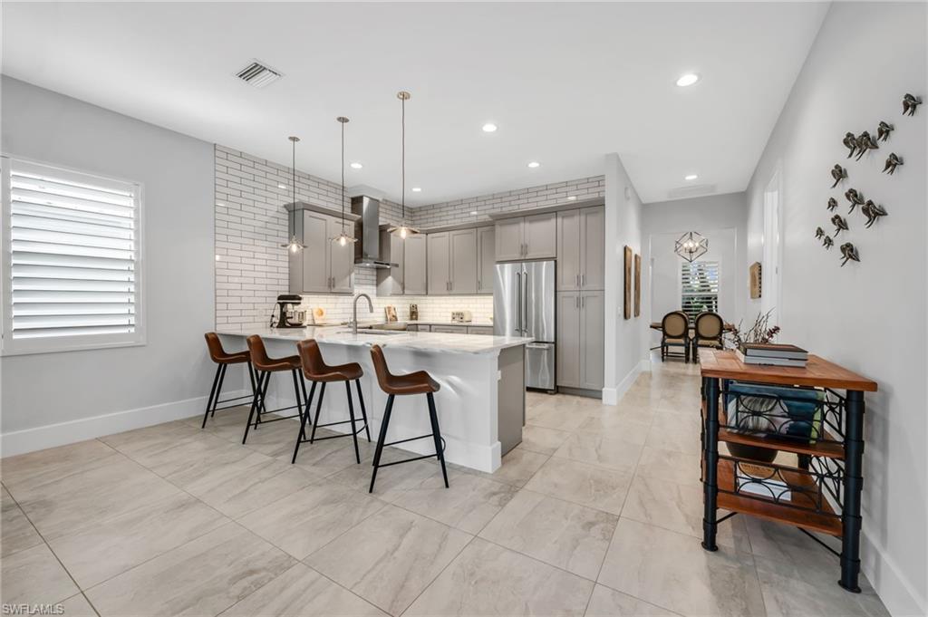 2464 Lake Avenue Naples, FL 34112 - Photo 5 of 38 Breakfast Bar & Kitchen - View 3
