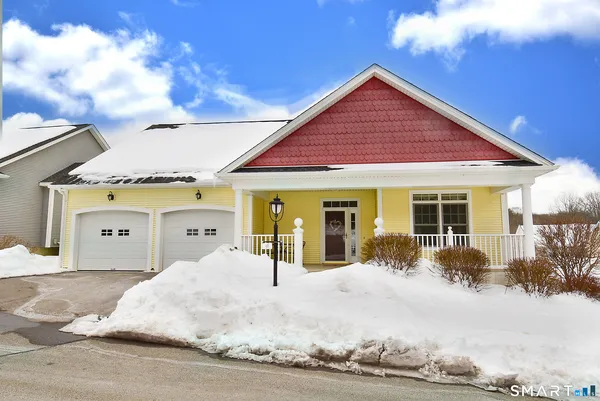 a front view of a house with a porch