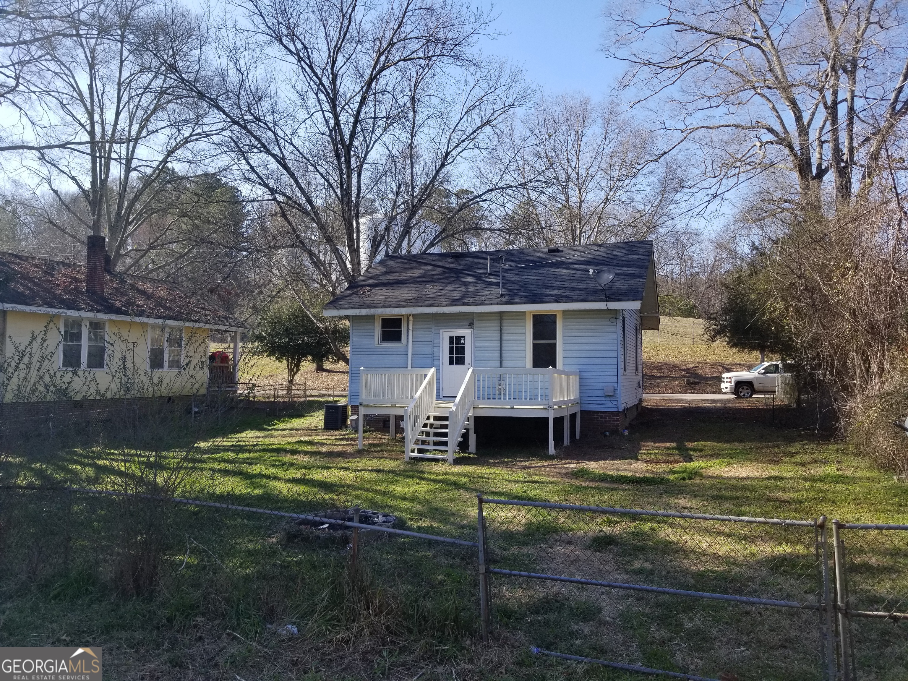 215 4th Street Rome, GA 30161 - Photo 10 of 12 a view of a house with backyard