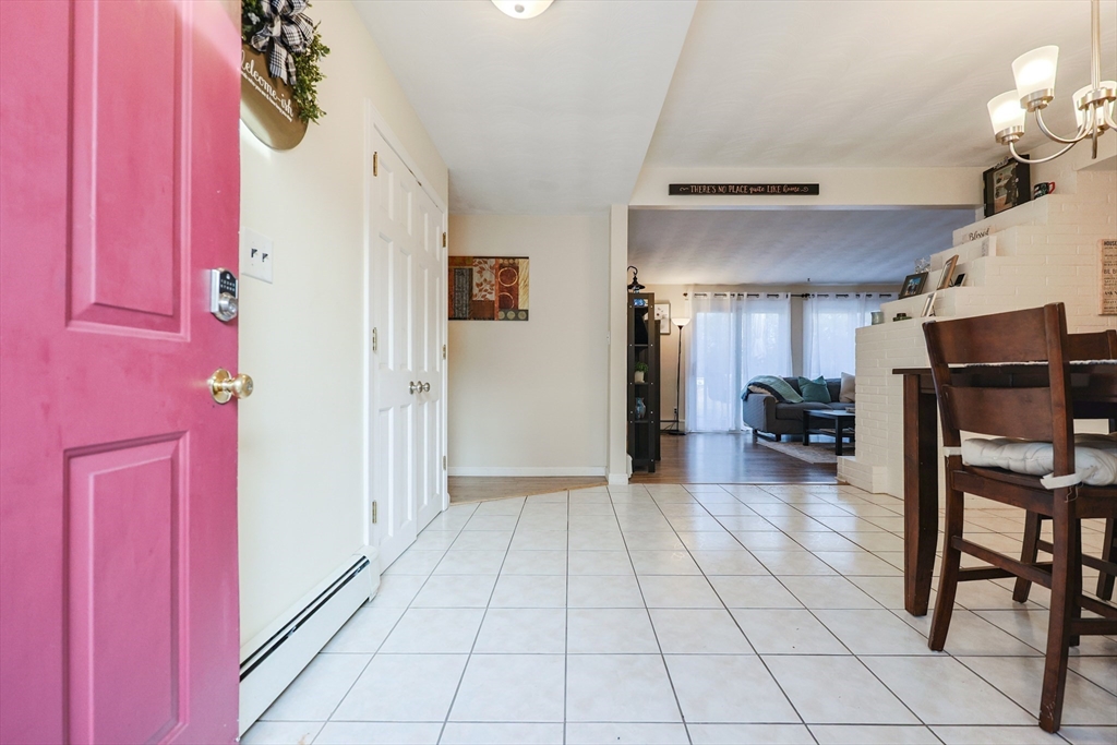 11 Edith Road Framingham, MA 01701 - Photo 2 of 37 a view of a livingroom with furniture and an entryway