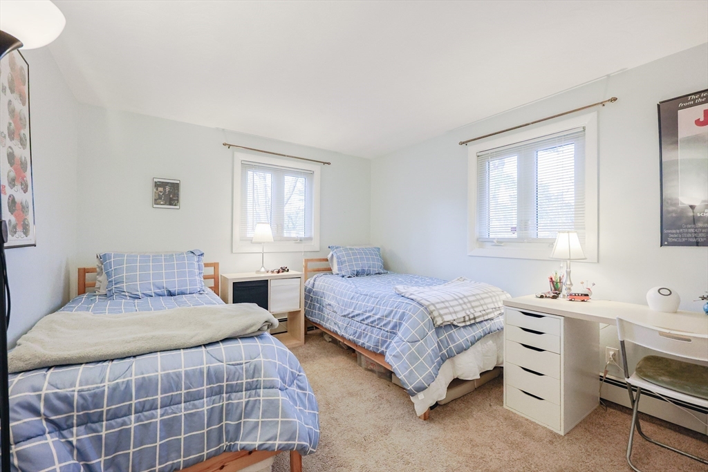 11 Edith Road Framingham, MA 01701 - Photo 22 of 37 a bedroom with a bed and a window