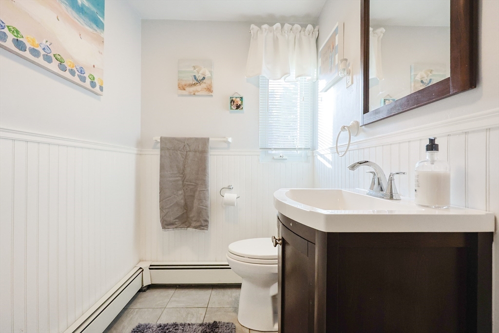 11 Edith Road Framingham, MA 01701 - Photo 26 of 37 a bathroom with a sink a toilet and shower