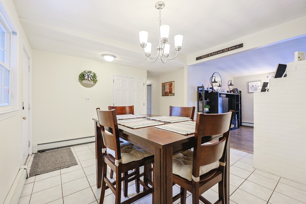11 Edith Road Framingham, MA 01701 - Photo 3 of 37 a view of a dining room with furniture and chandelier