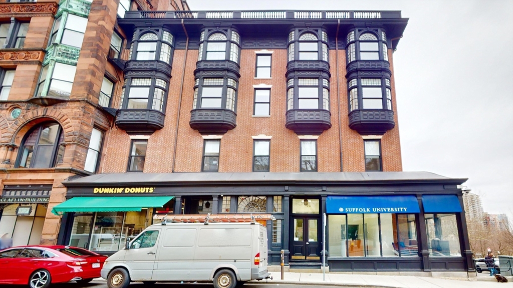22 Beacon Street, Unit 3 Boston, MA 02108 - Photo 13 of 28 a view of a building with car parked