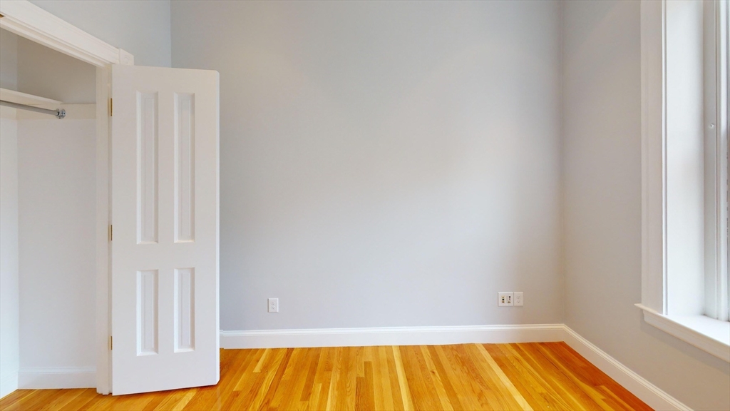 22 Beacon Street, Unit 3 Boston, MA 02108 - Photo 20 of 28 a view of a room with wooden floor and a window