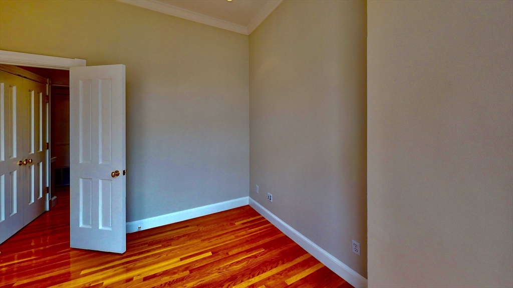 22 Beacon Street, Unit 3 Boston, MA 02108 - Photo 4 of 28 a view of a room with wooden floor
