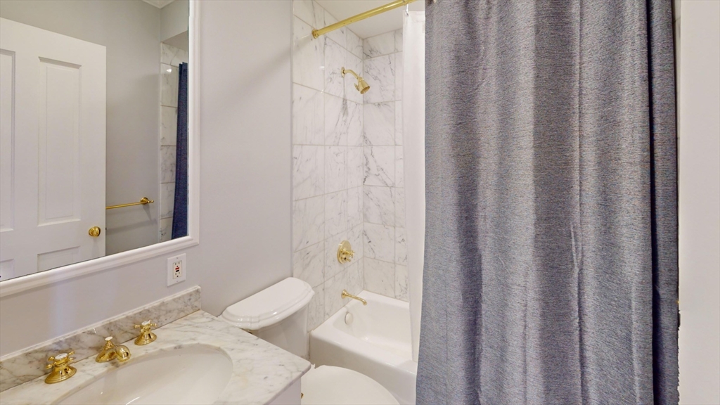 22 Beacon Street, Unit 3 Boston, MA 02108 - Photo 5 of 28 a bathroom with a sink and toilet