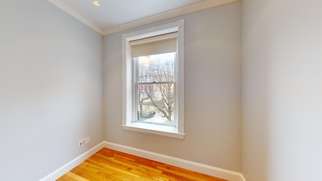22 Beacon Street, Unit 3 Boston, MA 02108 - Photo 10 of 28 a view of a room that has a window in it
