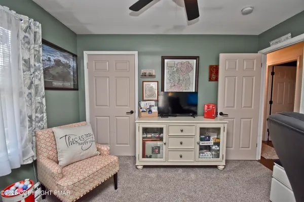 a kitchen with a sink appliances and cabinets